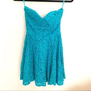 Teal strapless lace mini dress